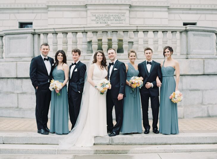 To complement the wedding’s refined setting, Alyse and Dimitry opted to take the black tie route for their wedding party’s attire. For the girls, Alyse selected a convertible A-line gown from Jenny Yoo’s bridesmaid collection in a soft shade of grayish blue, which fit the formality of the affair while allowing her bridesmaids to customize their look. Dimitry went all out classic when it came to his groomsmen and had the guys don traditional black tuxedos from Men’s Warehouse.