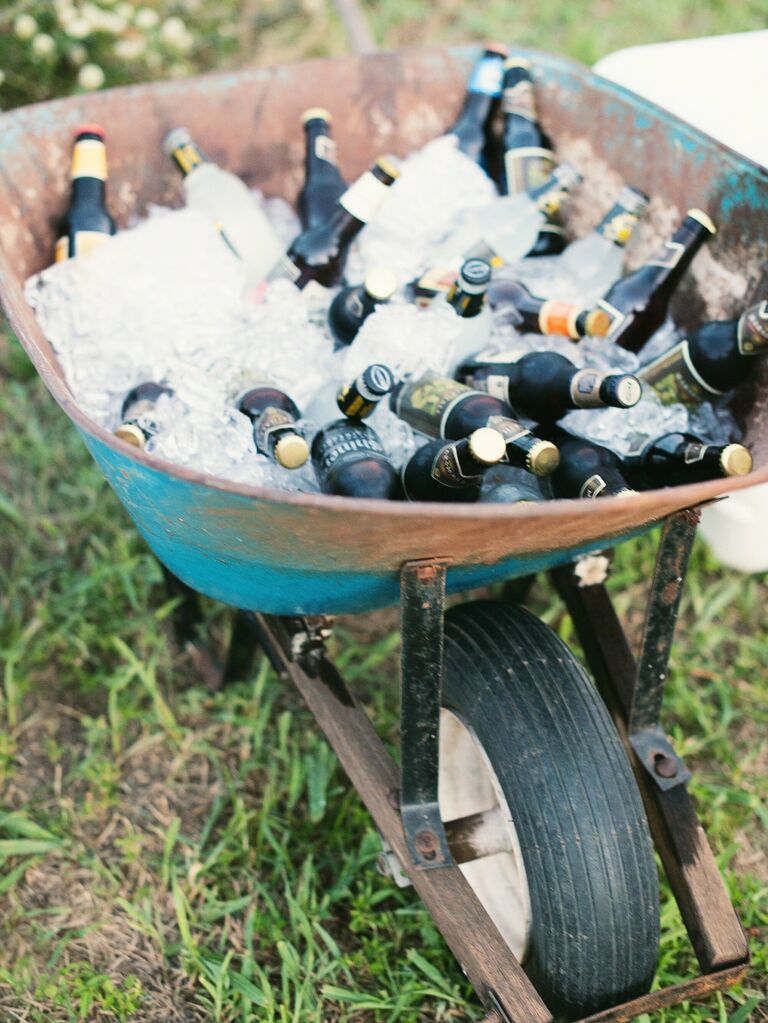 Wheelbarrow full of beer idea for BBQ engagement party. 