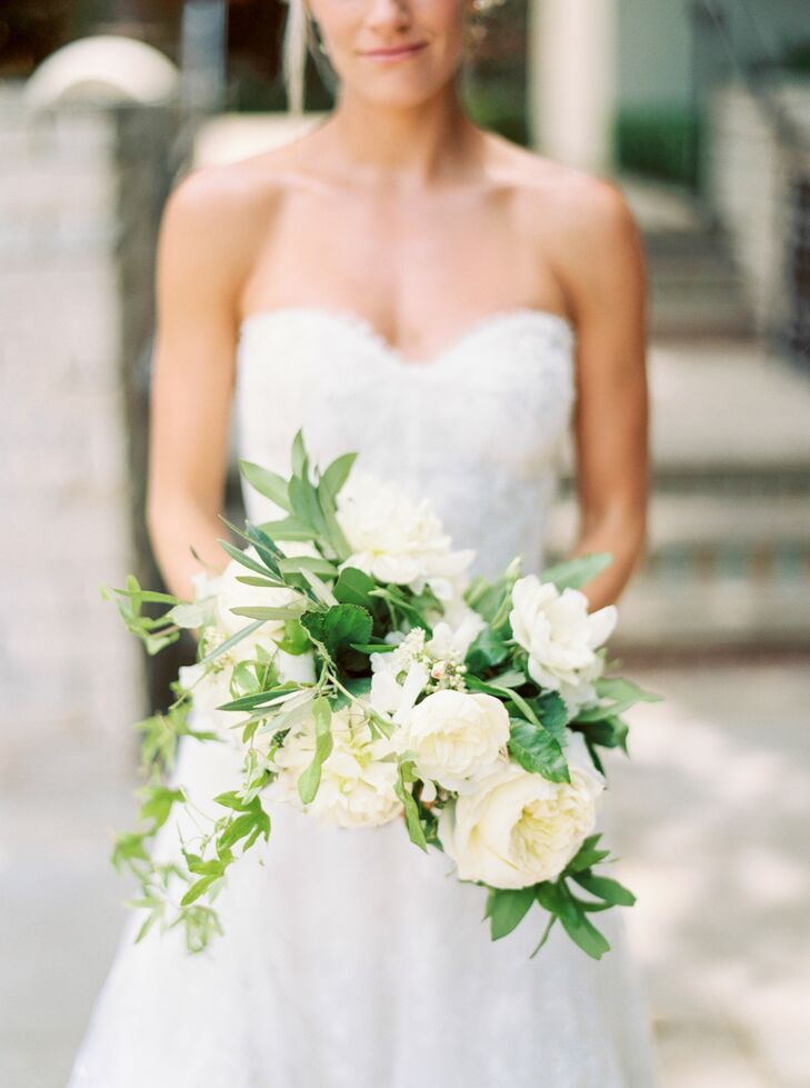 "For my flowers, I was all about greenery and organic, wild arrangements—ranunculus, garden roses. The messy-yet-put-together look all-around," says Anne. "I didn't want anything too coiffed."
