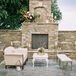 Outdoor Fireplace Lounge with White Furniture