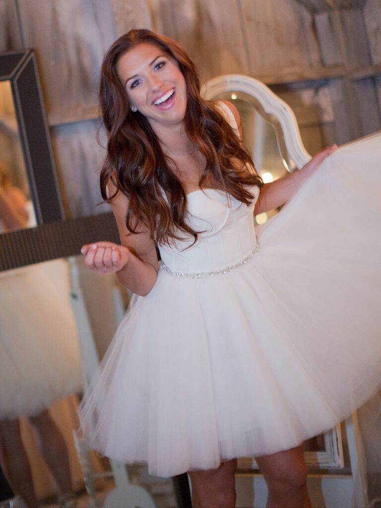 Alex Morgan in the custom Amsale mini dress she wore at her wedding reception