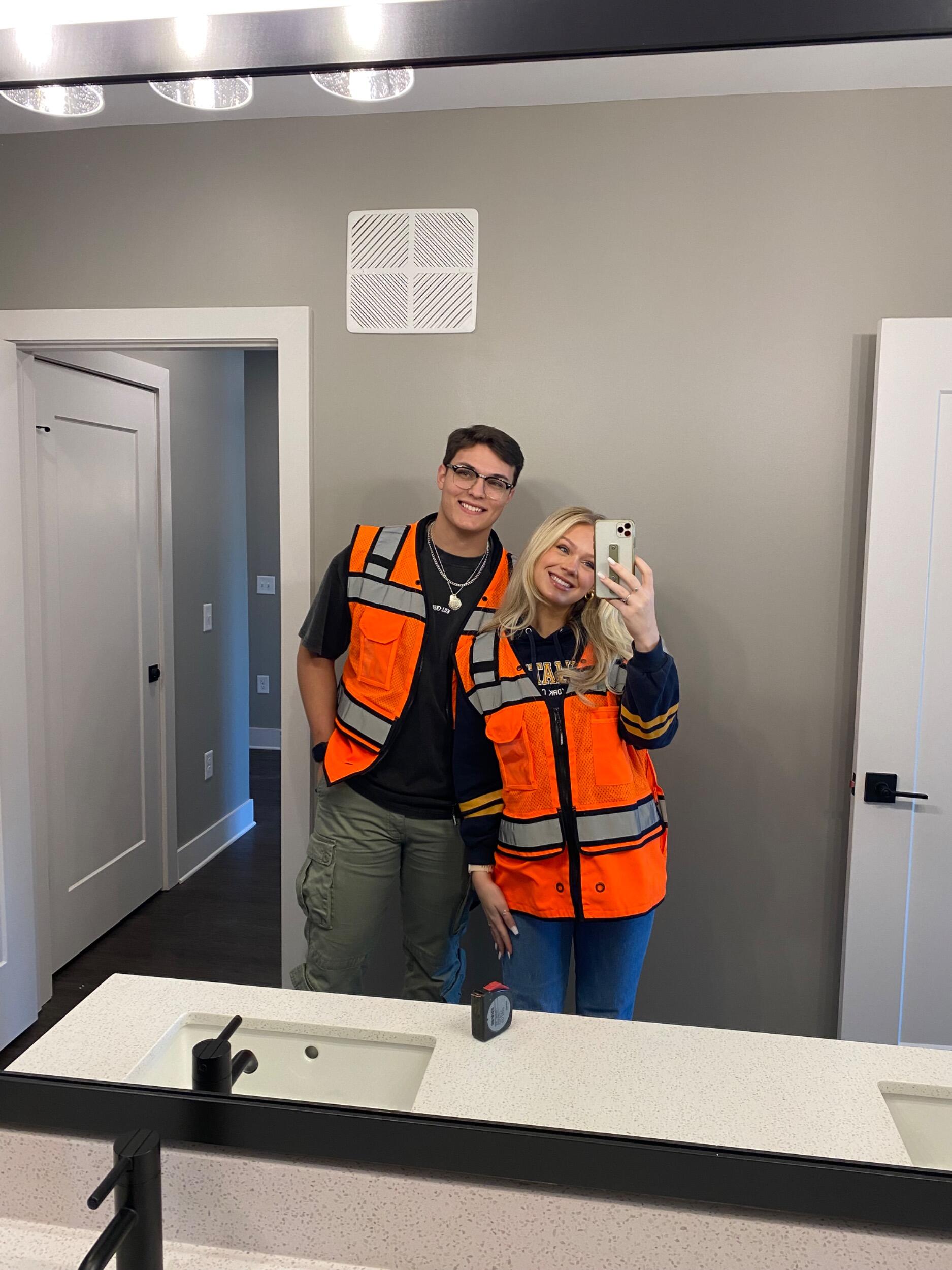 When Ruby took Ben to tour her apartment! We had to wear vests because Southern Post was still under construction.