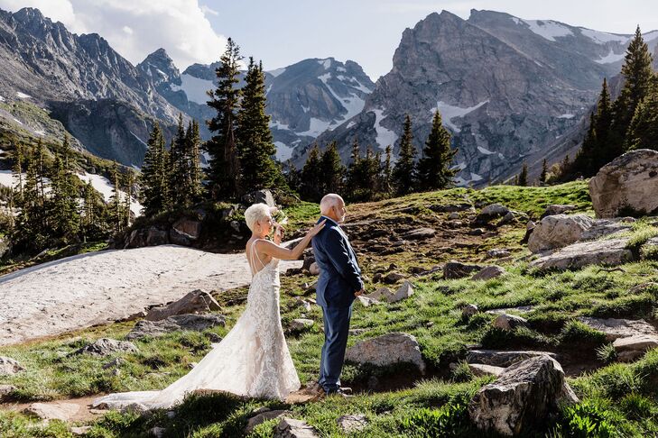 Bride in Gown and Groom in Blue Suit Have First Look on Mountain for Elopement