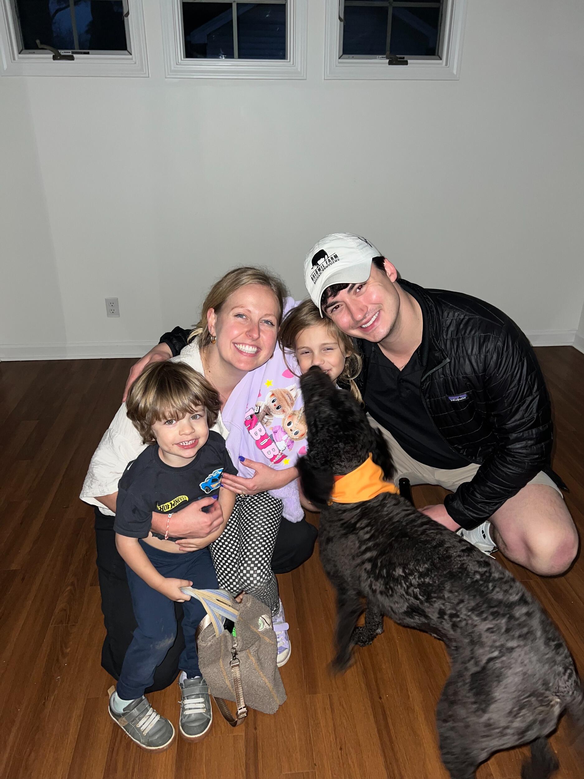 We bought a house! Our sweet pup, Gillie, has a big yard to play frisbee in!