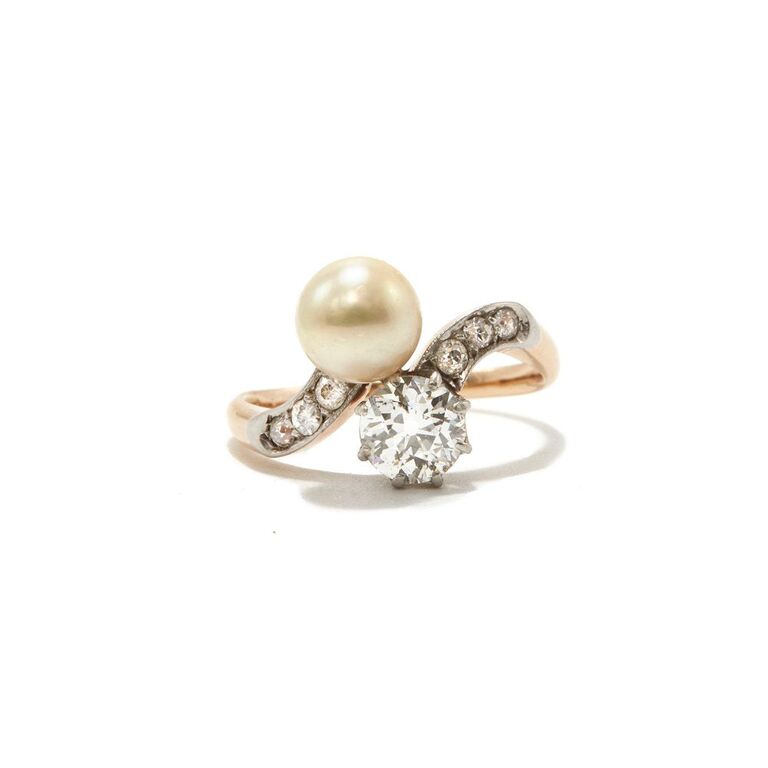 Edwardian-style pearl and diamond toi et moi engagement ring