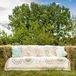 Leslie and Andrew had a small fire pit with hay bales set around it. Each bale had various quilts on top for a comfortable, casual look. They also constructed a hay-bale couch, with throw pillows and a large quilt over the top. Guests loved hanging out on it throughout the night.