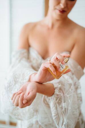 Bride Spritzing Chanel No. 5 Perfume on Wrists, Off-the-Shoulder Wedding Dress, Long Sleeves