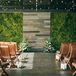 Loft Ceremony with Moss Wall, Candles and Wooden Folding Chairs