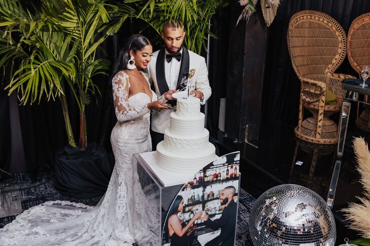 Bride and Groom During Cake Cutting