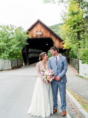 Bride and Groom Stroll Outside Woodstock Inn
