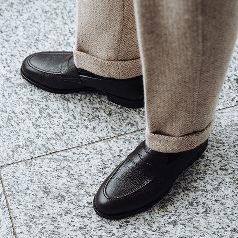 Black semi-formal loafers by Morjas. 