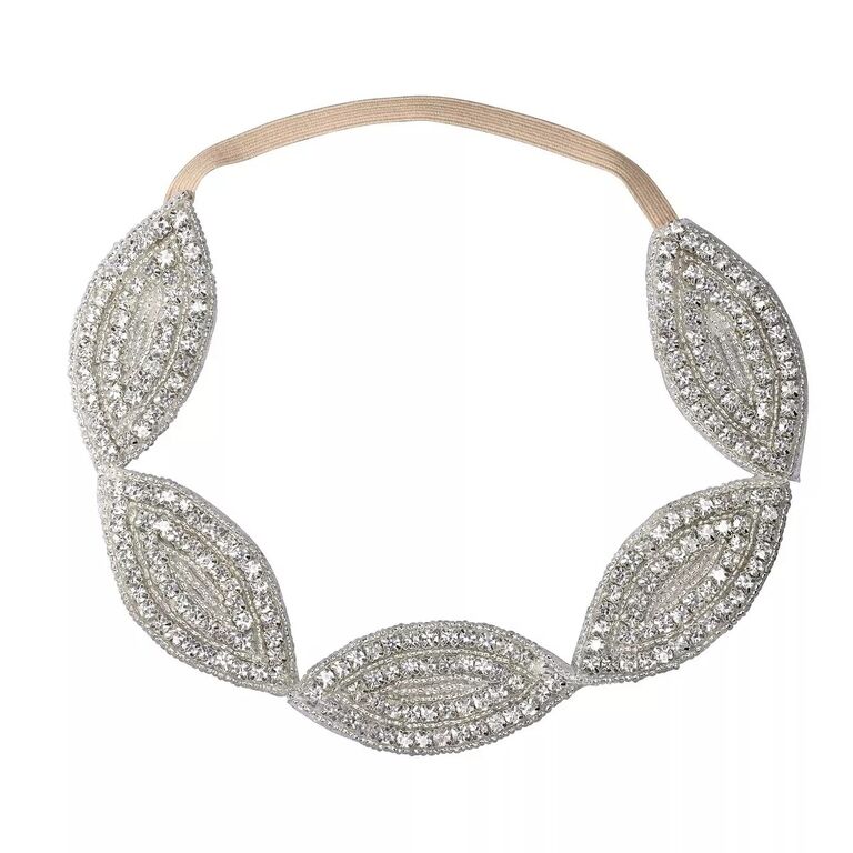 Headband featuring sparkling rhinestones. 