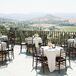 Seated Cocktail Tables With Black Chiavari Chairs on Patio