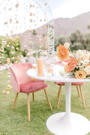 Whimsical Sweetheart Table with Pink Lounge Chairs and Candles