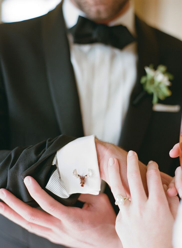 Cody wore a Burberry tuxedo with matching jacket,  suspenders and a real bow tie. But it was the pair of moose-head cuff links crafted by Deakin & Francis U.K. that Katie surprised him with that; it gave his look a little Wyoming western flair.