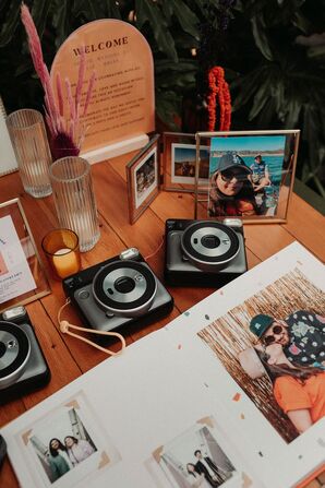 Polaroid Photo Guest Book With Cameras, Framed Photos and Candles