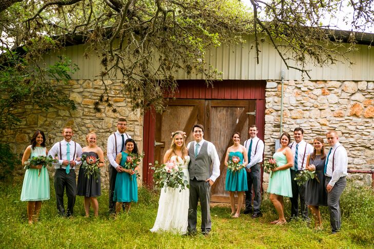 Mindy’s bridesmaids wore chiffon dresses in a mix of gray, mint and teal hues from Target. She let each woman choose her own dress style, which was then paired with jewelry and sandals that matched Mindy’s. The groomsmen wore classic gray J.Crew  pants, white dress shirts with mismatched suspenders and brown dress shoes.