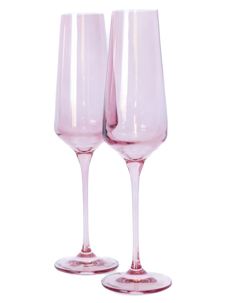 Pink colored champagne flutes for wedding