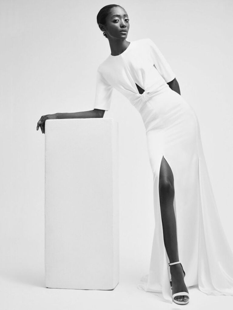 yolancris plain white satin high neck wedding dress with short sleeves chest cutout flowy skirt and slit