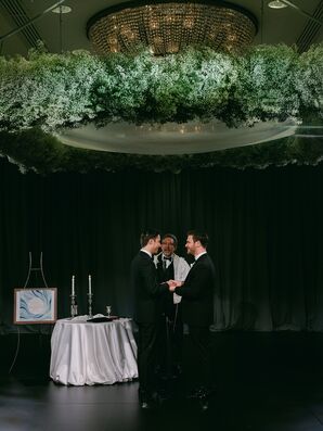 Grooms Under Floating Chuppah of Baby's Breath With Rabbi, Chandelier