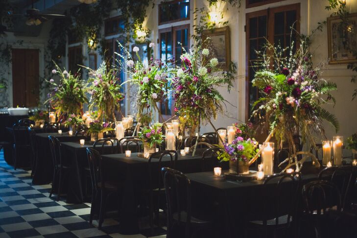 "We went for a romantic-eclectic-overgrown-rustic-Louisiana-swamp vibe," Tess says of her inspiration. The couple's florist put together the antler arrangements and vines draped throughout the indoor spaces.