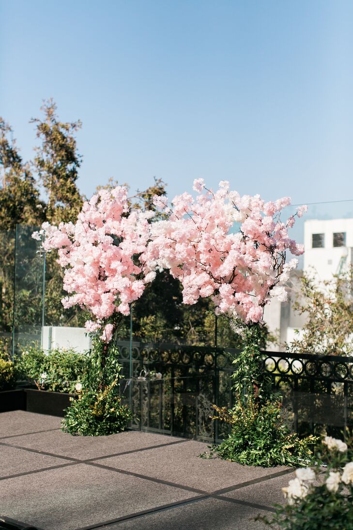 Rooftop Ceremony Arch with Cherry Blossoms and Greenery