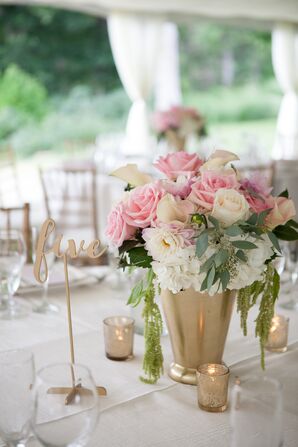 Pink and White Flower Arrangements in Gold Vases