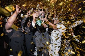 Gold Confetti and Dom Perignon Champagne During New Year's Eve Countdown at Wedding