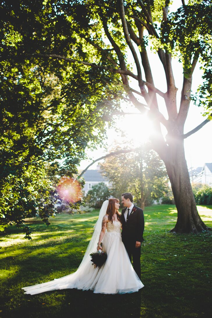 The nontraditional couple used a romantic color scheme of blush, red, ivory, lots of glittery gold details and touches of silver for their unique, vin