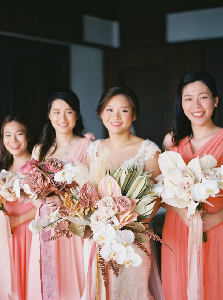 Bridesmaids in Coral Dresses with Anthurium Bouquets in Phuket, Thailand