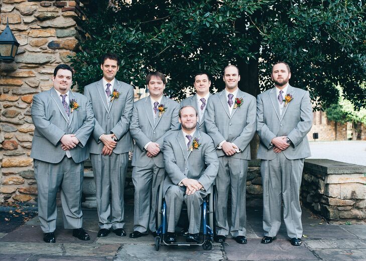 Adam's groomsmen wore light gray suits and purple paisley ties.