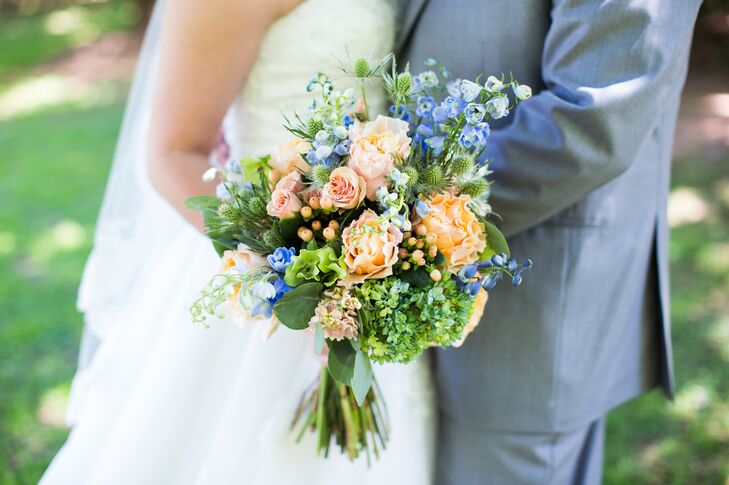 Sarah's bouquet included subtle pastel hues of peaches mixed with light blues and greens. It had peach garden roses, bellflowers, stock, mini hydrangeas, thistles and—for a truly Georgia touch—peach hypericum berries.