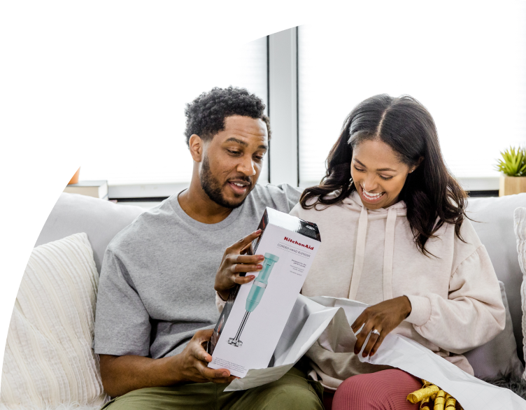 wedding couple opening up registry gifts