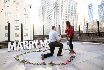 Marriage proposal on rooftop
