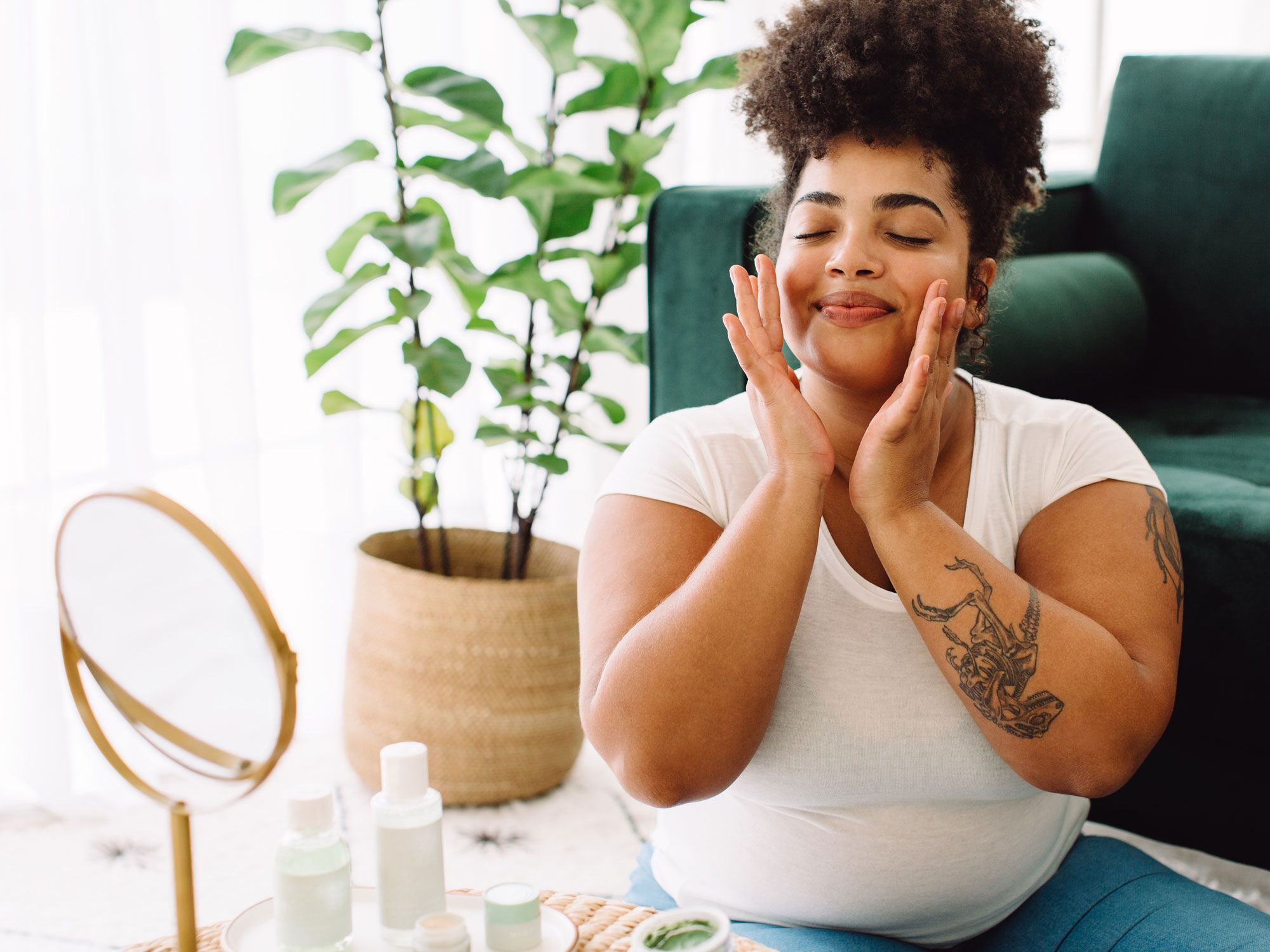 Woman showing how to get rid of acne with skincare routine