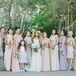 The young flower girl dressed in a white knee-length dress and a silver belt stood with Marisa and the rest of the bridesmaids. The ladies wore dresses in different styles, lengths and hues, creating a collection of pastels that matched the day's romantic vibe.
