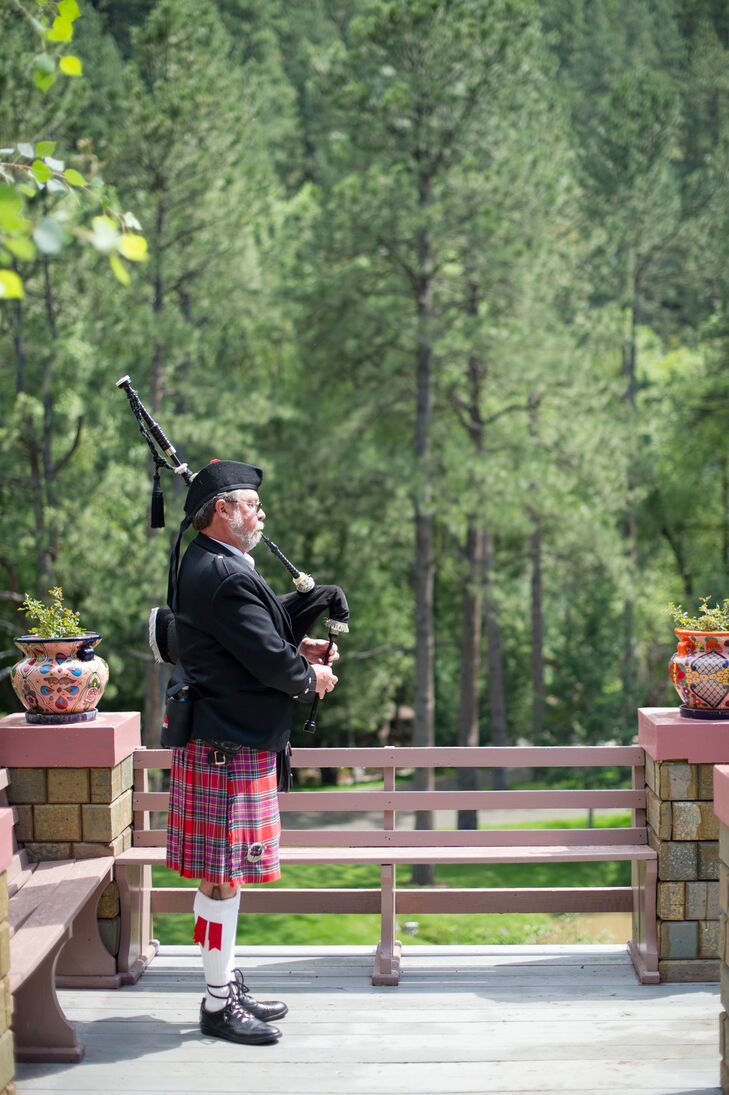 A traditional Scottish bagpiper played during Ashley and Kyle's ceremony.