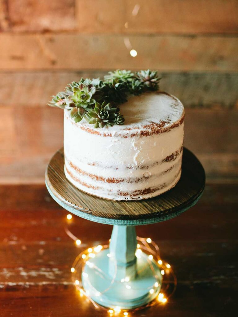 Semi-naked wedding cake with succulents