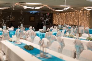 Long Tables with Blue Runners and Silver Decor at Reception