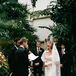 Grooms Reading Smiling Bride His Vows From Vow Book, Industrial Greenhouse Ceremony