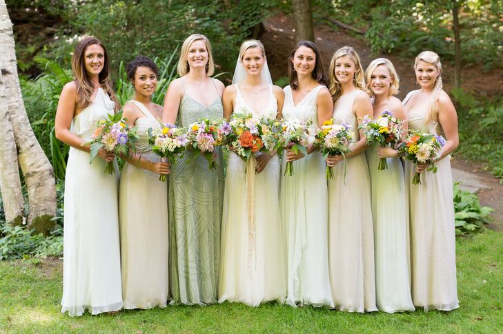The bridesmaids picked their own style of gown in gorgeous shades of mint and champagne.