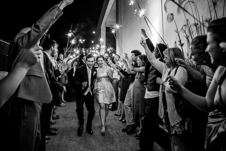 Chelsea and Chris exited the reception that took place at Terra Gallery in San Francisco, California, where friends and family lined up on both sides of them and held sparklers in celebration of their marriage.