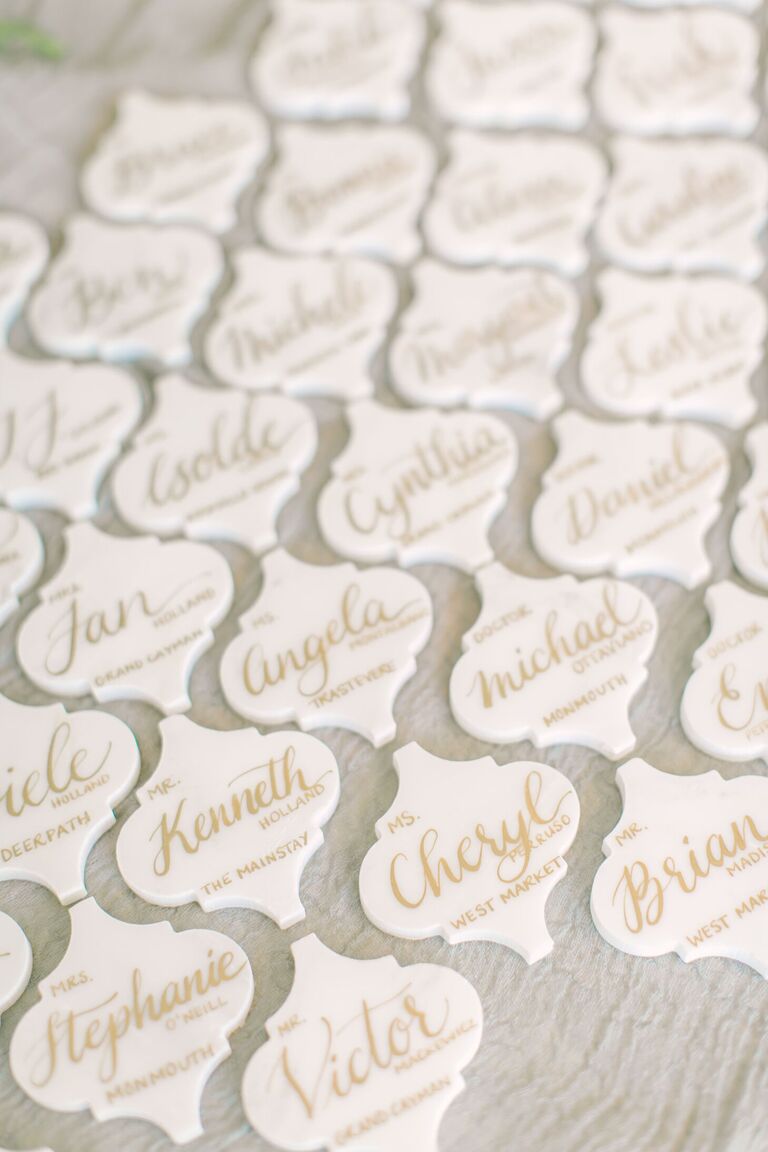 Calligraphed marble tile escort cards