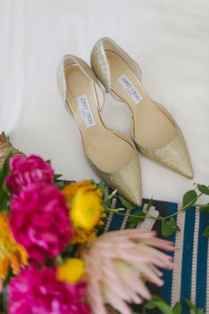 Diana's neutral metallic Jimmy Choos matched her glittery gown and let her vibrant tropical blossom bouquet stand out. "Stem Events put together the wildest bouquets, complete with mini pineapples, large palms and giant proteas," Diana says.