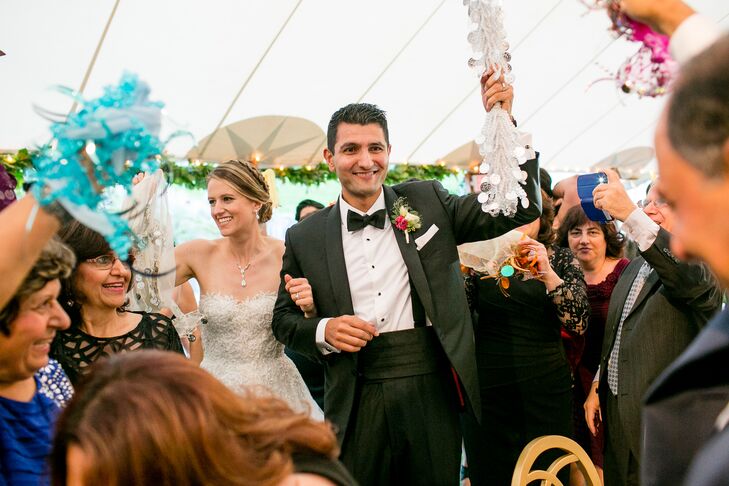 "Pierre and I wanted to ensure that event reflected our personalities and families,” says Laura, whose family is both Catholic and Jewish, while Pierre’s is Assyrian. An eclectic music playlist helped these distinct backgrounds shine on the dance floor, which stayed packed with revelers through Taylor Swift songs, traditional Assyrian music and "Hava Nagilia."
