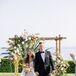 Bride and Groom Recessional, Lawn Ceremony, Neutral Colors, Flowers on Wooden Arch