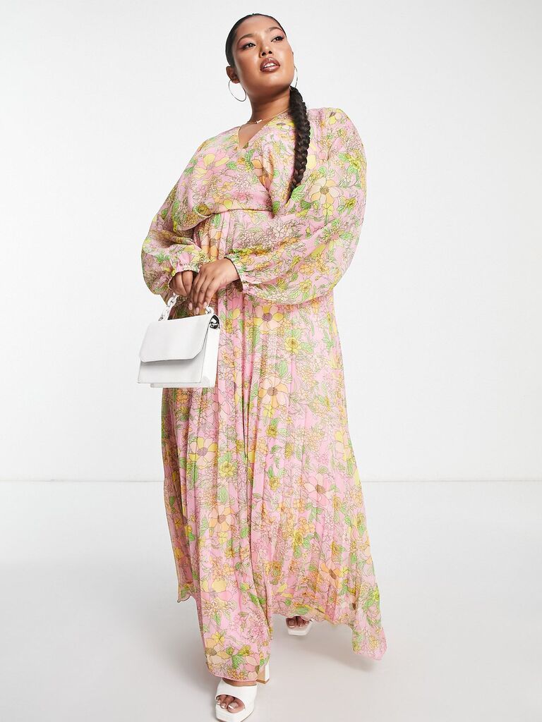 daytime formal wedding guest dress with yellow and pink floral print and long sleeves 