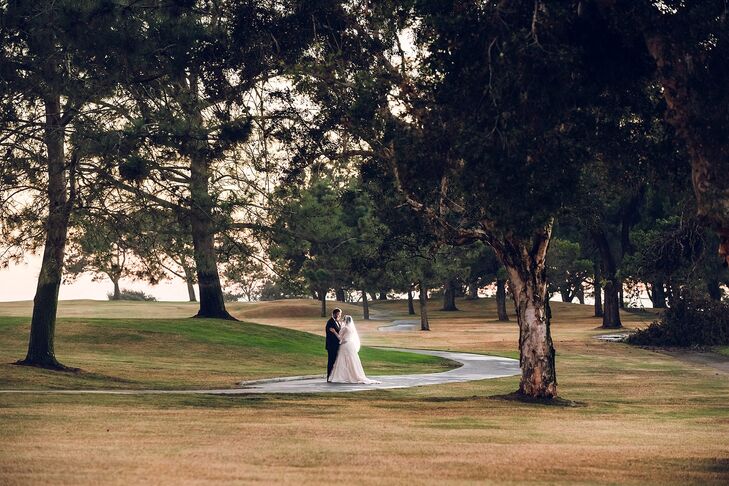 Cassandra and Stephen stood surrounded by the trees at the Lodge at Torrey Pines in San Diego, California, which is known as the site of the 2008 US Open golf championships. They fell in love with the beautiful landscaping, and the helpful staff won them over as well.