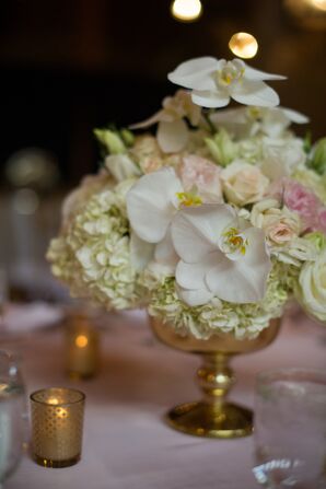 Low White and Pink Centerpieces of Stephanotis, Hydrangeas and Roses