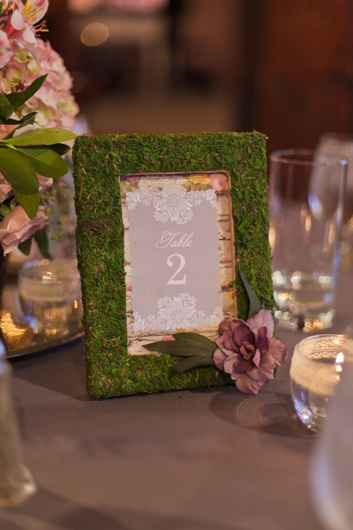 Kristen made the table numbers, which were moss covered picture frames with a different lace, flower or key decoration on them.
